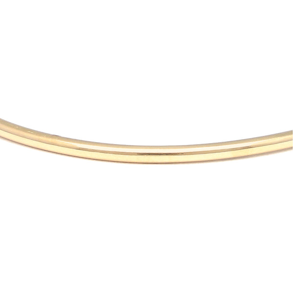Pulsera de arillo abierta con diamantes en oro amarillo 14 kilates.