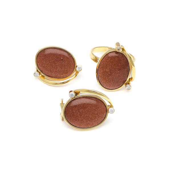Juego anillo y aretes diseño especial con venturinas y circonias en oro amarillo 14 kilates.