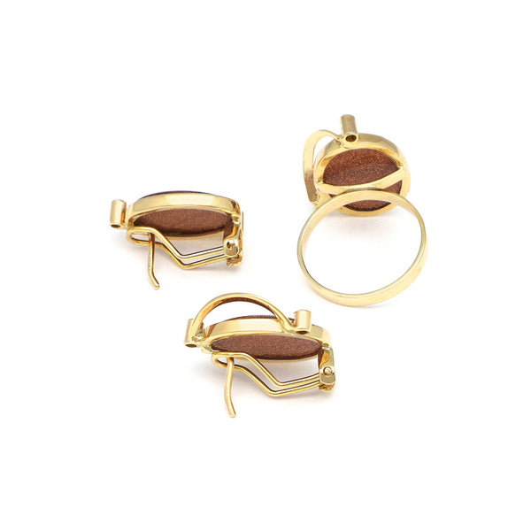 Juego anillo y aretes diseño especial con venturinas y circonias en oro amarillo 14 kilates.