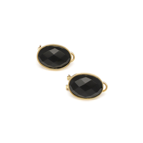 Aretes diseño especial con ónix en oro amarillo 14 kilates.