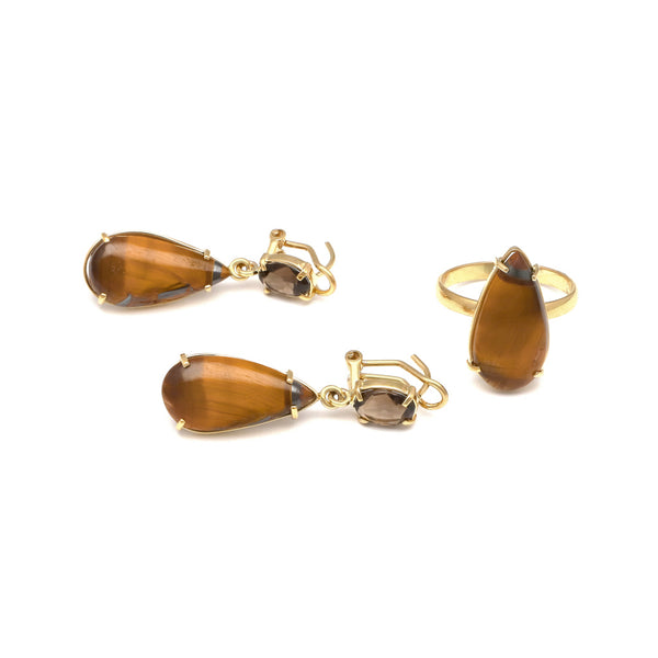 Juego de anillo y aretes diseño especial con ojo de tigre y topacio en oro amarillo 14 kilates.