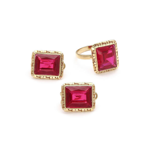 Juego anillo y aretes calados con rubíes en oro amarillo 14 kilates.
