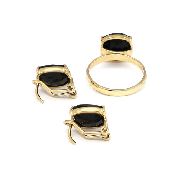 Juego anillo y aretes diseño especial con ónix en oro amarillo 14 kilates.