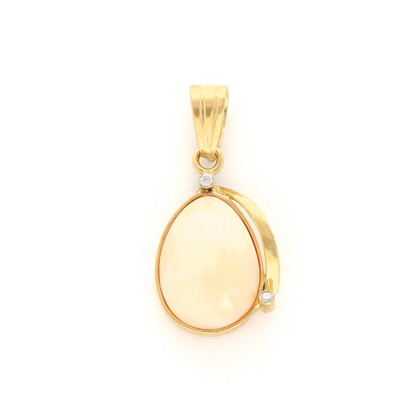 Dije diseño especial con ópalo y circonias en oro amarillo 14 kilates.