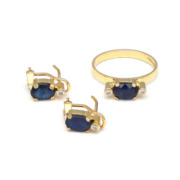 Juego de anillo y aretes diseño especial con zafiro y cirnonia en oro amarillo 14 kilates.