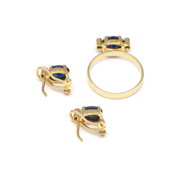 Juego de anillo y aretes diseño especial con zafiro y cirnonia en oro amarillo 14 kilates.