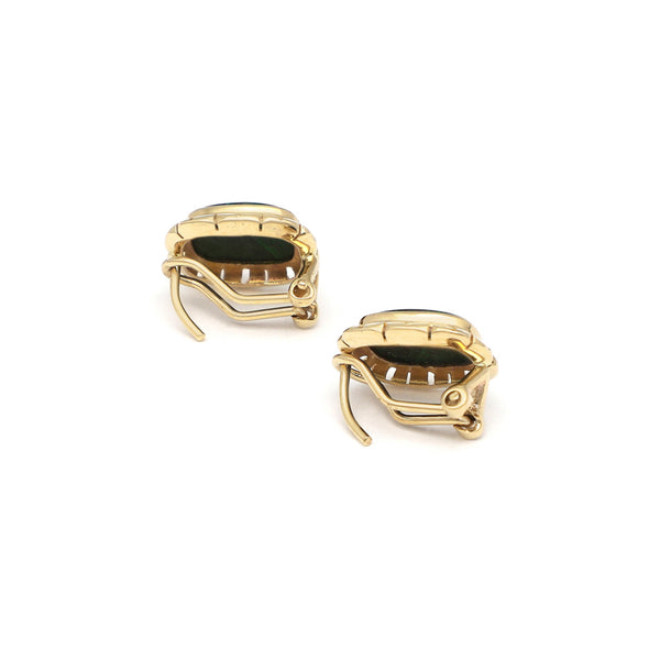 Juego de anillo y aretes calados con malaquita en oro amarillo 14 kilates.