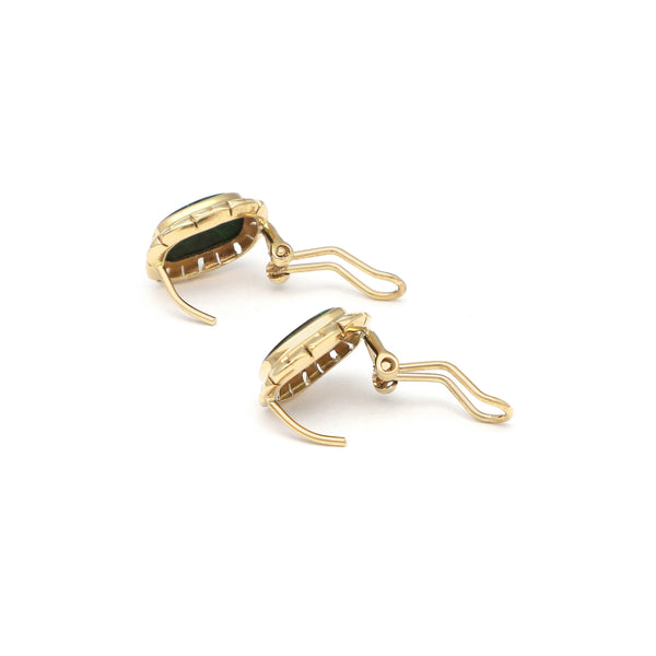 Juego de anillo y aretes calados con malaquita en oro amarillo 14 kilates.