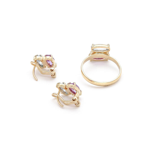 Juego de anillo y aretes diseño especial con alejandrina y topacio en oro amarillo 14 kilates.