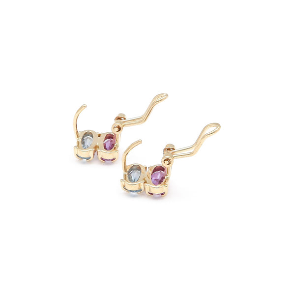 Juego de anillo y aretes diseño especial con alejandrina y topacio en oro amarillo 14 kilates.