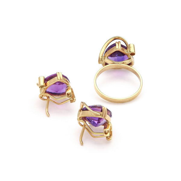 Juego de aretes y anillo diseño especial con amatistas y circonias en oro amarillo 14 kilates.