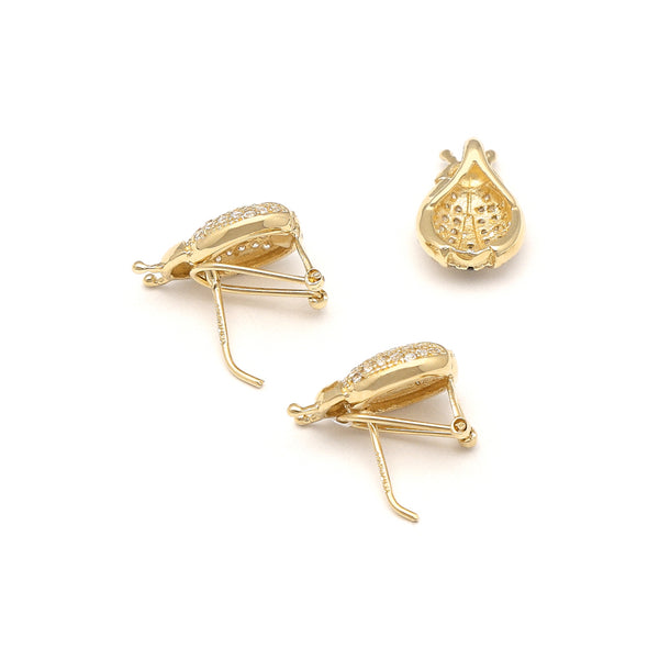 Juego de aretes y dije diseño especial motivo catarina con sintéticos en oro amarillo 14 kilates.