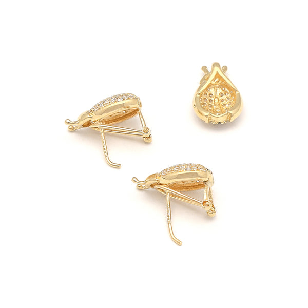 Juego de aretes y dije diseño especial con sintéticos motivo catarina en oro amarillo 14 kilates.