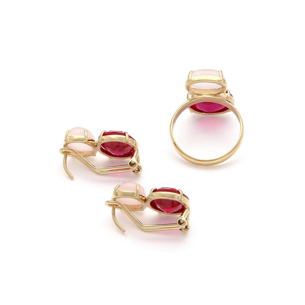 Juego de anillo y aretes diseño especial con rubíes y piedra lunar en oro amarillo 14 kilates.