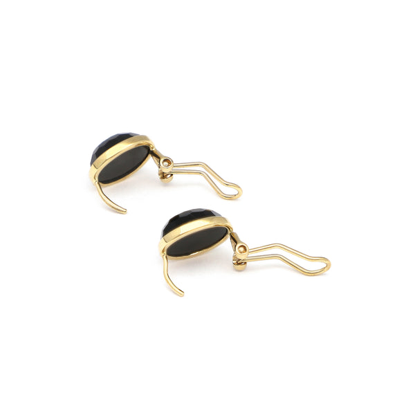 Juego de anillo y aretes diseño especial con ónix en oro amarillo 14 kilates.