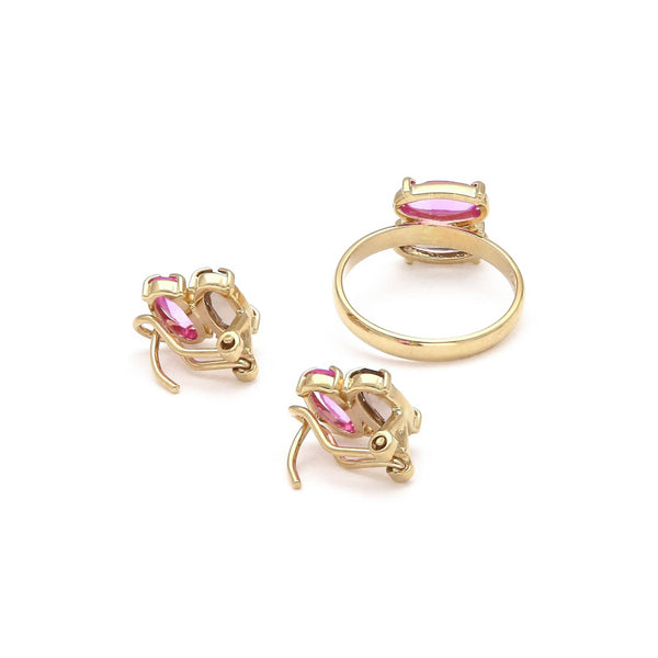 Juego de anillo y aretes diseño especial con rosa de Francia y topacio en oro amarillo 14 kilates.