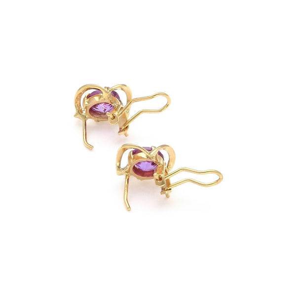 Juego anillo y aretes calados con alejandrinas en oro amarillo 14 kilates.
