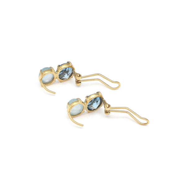 Juego de anillo y aretes diseño especial con blue London y piedra de luna en oro amarillo 14 kilates.