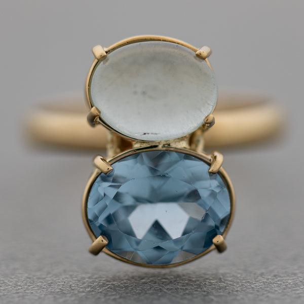 Juego de anillo y aretes diseño especial con blue London y piedra de luna en oro amarillo 14 kilates.
