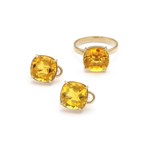 Juego anillo y aretes diseño especial con citrinos en oro amarillo 14 kilates.