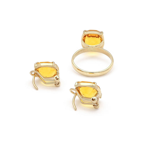 Juego anillo y aretes diseño especial con citrinos en oro amarillo 14 kilates.