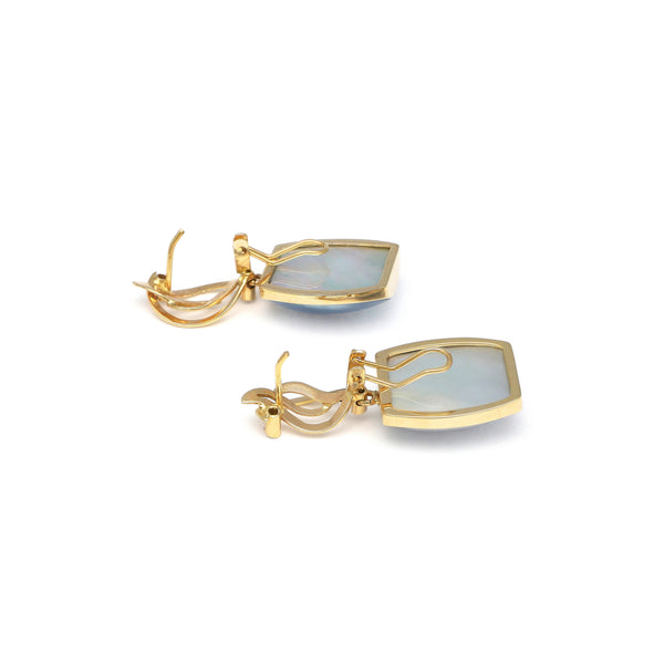 Juego anillo y aretes diseño especial con colgantes de osmeñas y circonias en oro amarillo 14 kilates.
