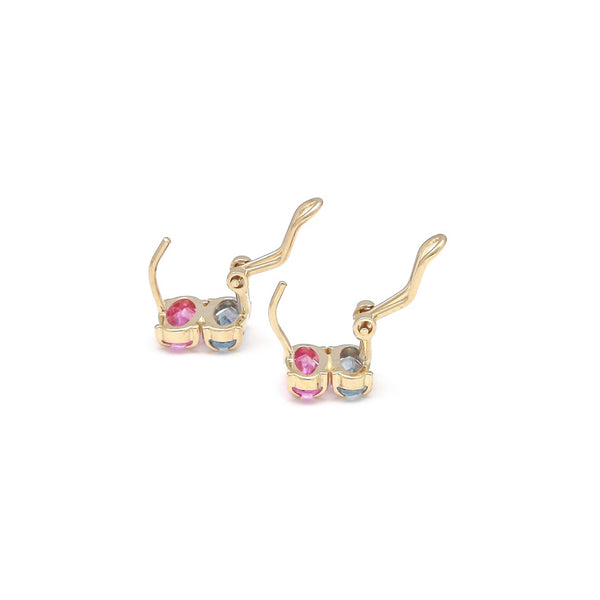 Juego anillo y aretes diseño especial con rosas de Francia y topacios en oro amarillo 14 kilates.