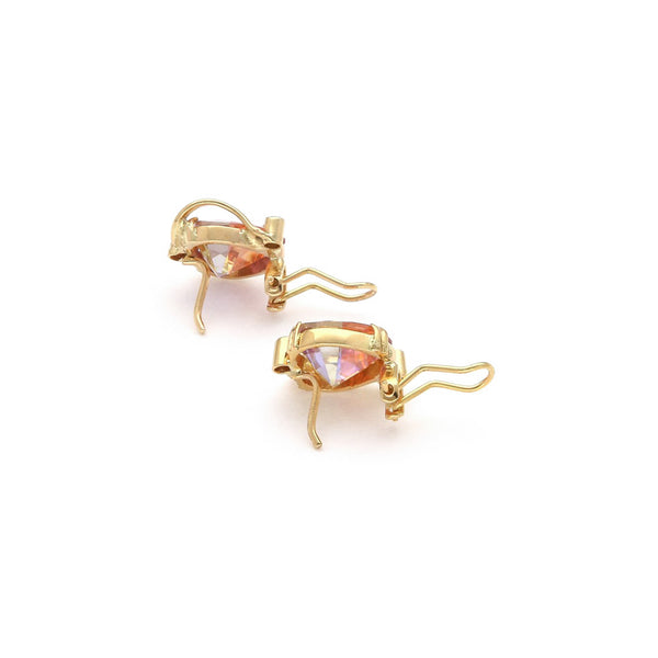 Juego anillo y aretes diseño especial con topacios y circonias en oro amarillo 14 kilates.