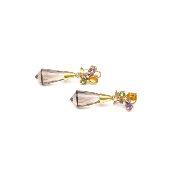 Aretes estilizados con topacios y gemas en oro amarillo 14 kilates.
