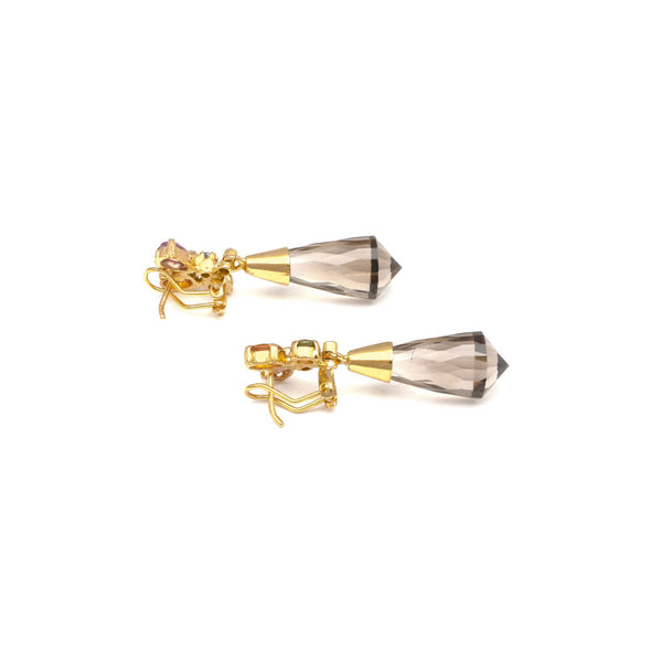 Aretes estilizados con topacios y gemas en oro amarillo 14 kilates.