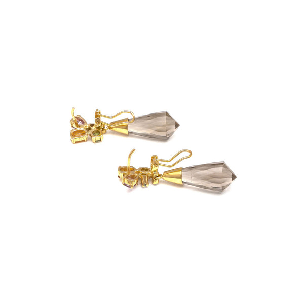 Aretes estilizados con topacios y gemas en oro amarillo 14 kilates.