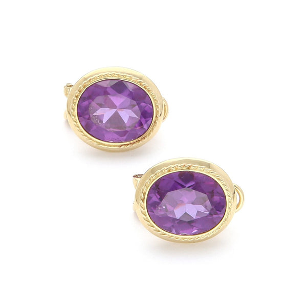 Aretes diseño especial con alejandrina en oro amarillo 14 kilates.