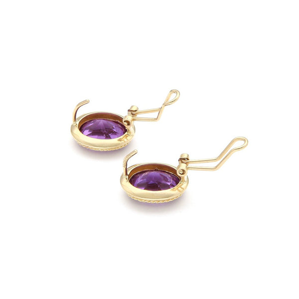 Aretes diseño especial con alejandrina en oro amarillo 14 kilates.
