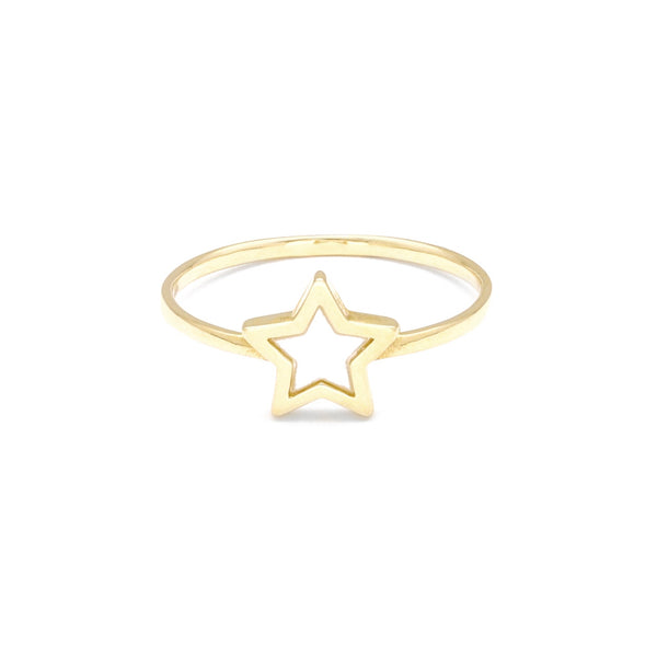 Anillo diseño especial motivo estrella con sintético en oro amarillo 14 kilates.