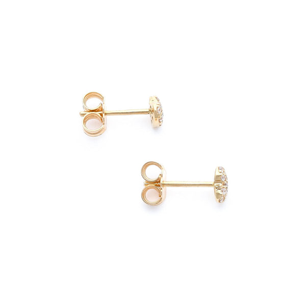 Aretes diseño especial motivo corazón con circonias en oro amarillo 14 kilates.