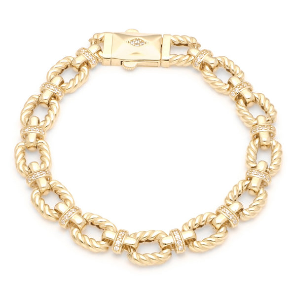 Pulsera eslabón combinado con circonias en oro amarillo 14 kilates.
