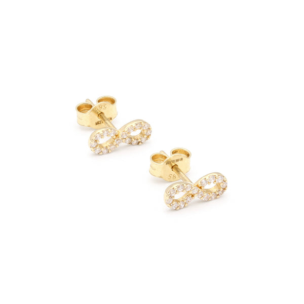 Aretes diseño especial con circonias motivo infinito en oro amarillo 14 kilates.