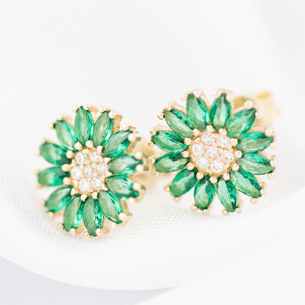 Aretes diseño especial con sintéticos motivo flor en oro amarillo 14 kilates.