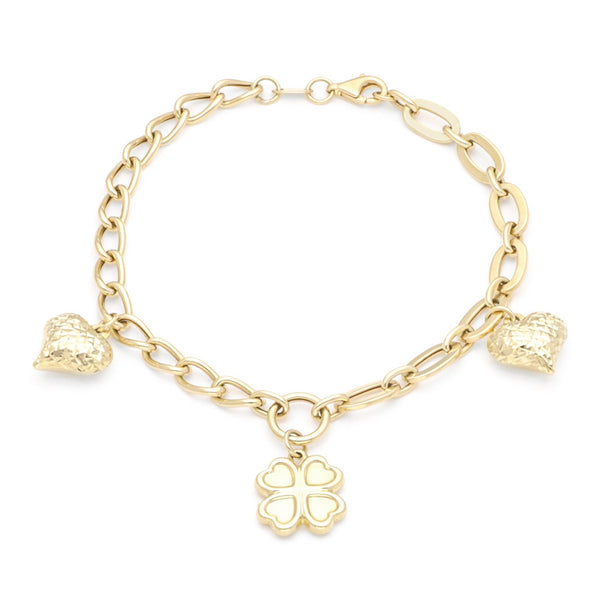 Pulsera eslabón combinado con colgantes motivo corazón y trébol en oro amarillo 14 kilates.