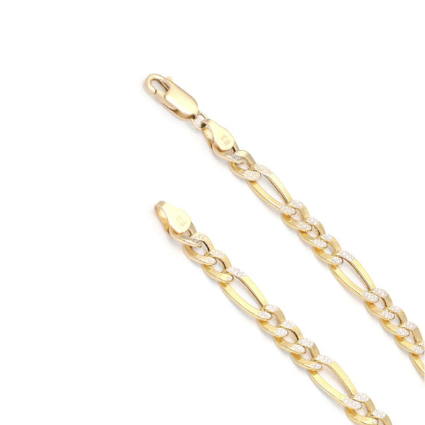 Pulsera de tres eslabones por uno platinados en oro amarillo 14 kilates.