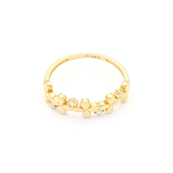 Anillo diseño especial motivo flores con circonias en oro amarillo 14 kilates.