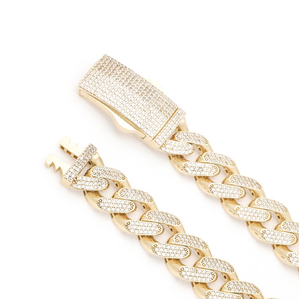 Pulsera eslabón barbado con circonias en oro amarillo 14 kilates.