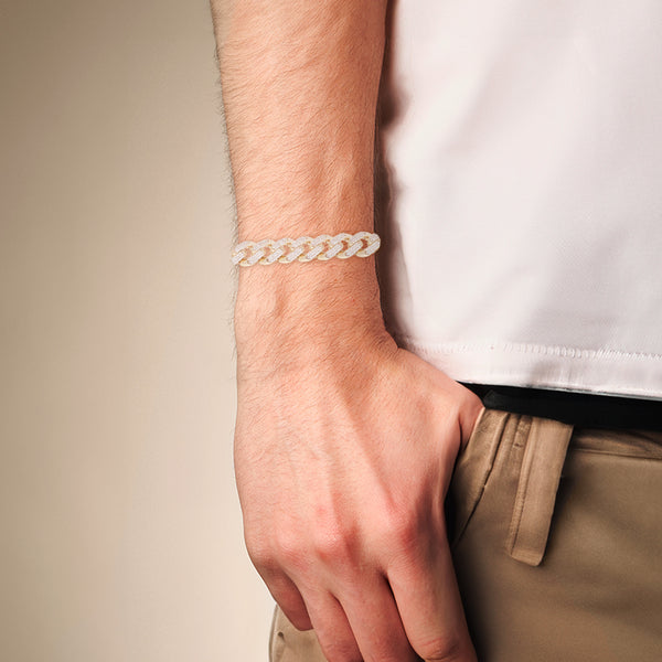 Pulsera eslabón barbado con circonias en oro amarillo 14 kilates.