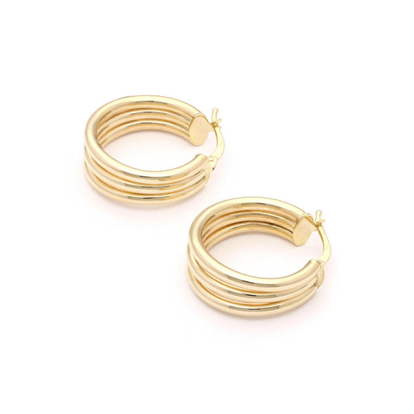 Arracadas huecas en oro amarillo 14 kilates.