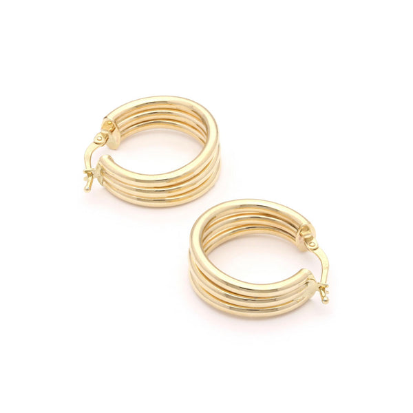 Arracadas huecas en oro amarillo 14 kilates.
