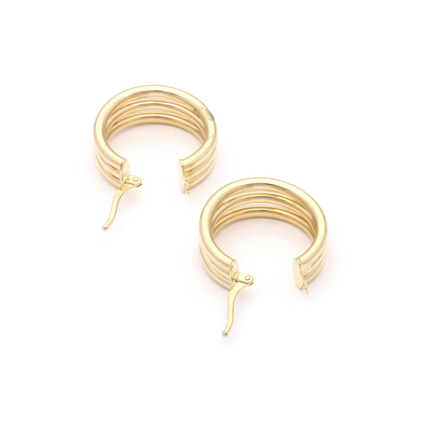 Arracadas huecas en oro amarillo 14 kilates.