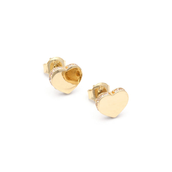 Aretes lisos con circonias motivo corazón en oro amarillo 14 kilates.
