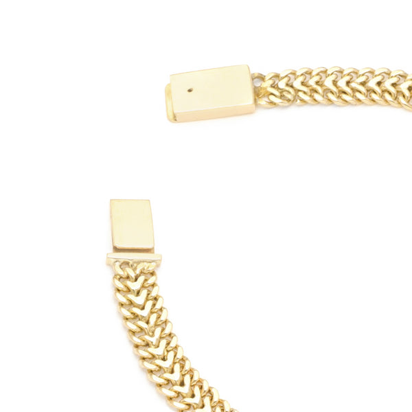 Pulsera eslabón tejido en oro amarillo 14 kilates.