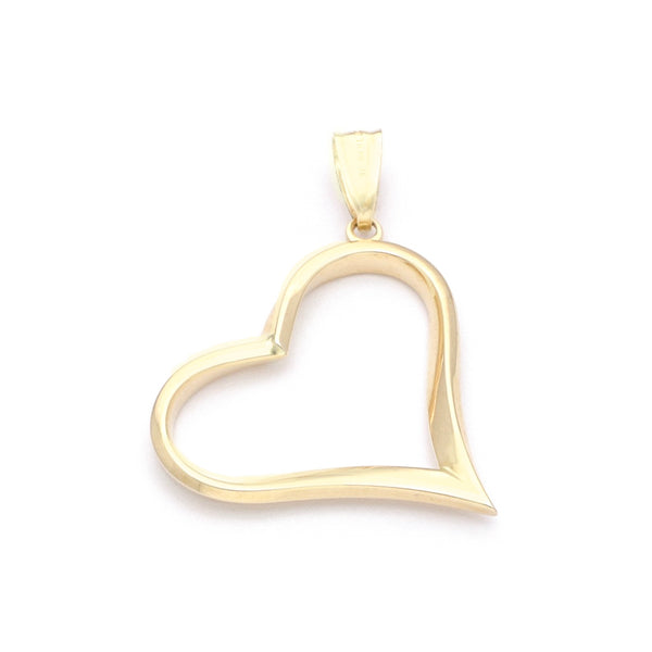 Dije facetado motivo corazón en oro amarillo 14 kilates.