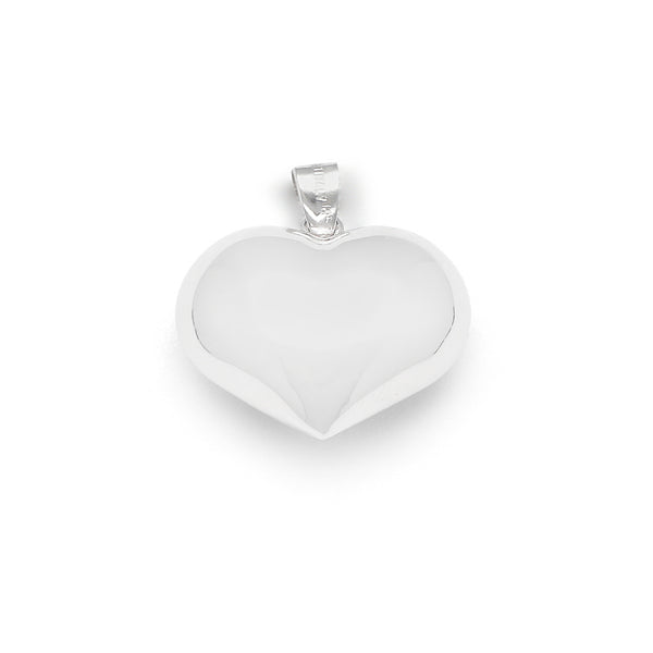 Dije hueco motivo corazón en oro blanco 14 kilates.